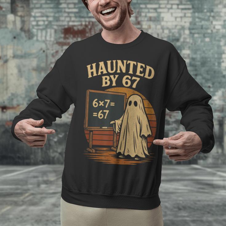 Haunted By 67 Ghost Math Joke Student Halloween Nerd Teacher Unisex Sweatshirt, gift for family, gift for coworker Haunted By 67 Ghost Math Joke Student Halloween Nerd Teacher Unisex Sweatshirt, gift for family, gift for coworker