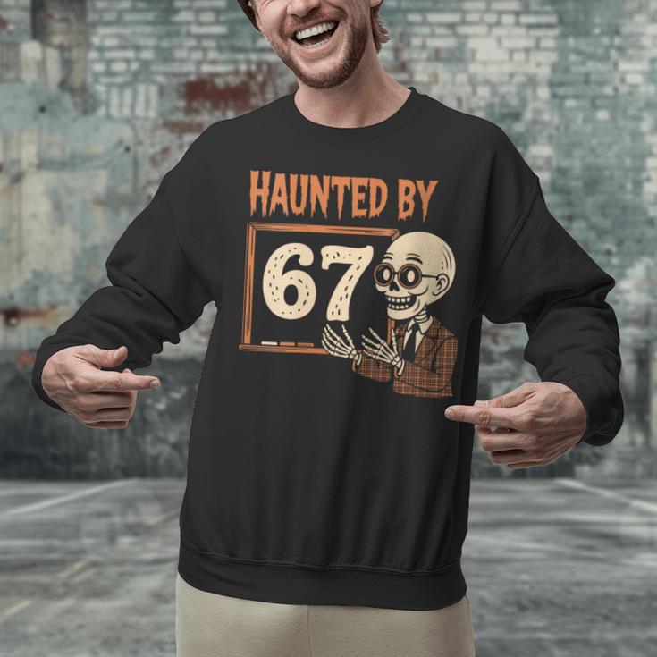 Haunted By 67 Halloween 67 Meme Six Seven Teacher Unisex Sweatshirt, gift for family, gift for coworker