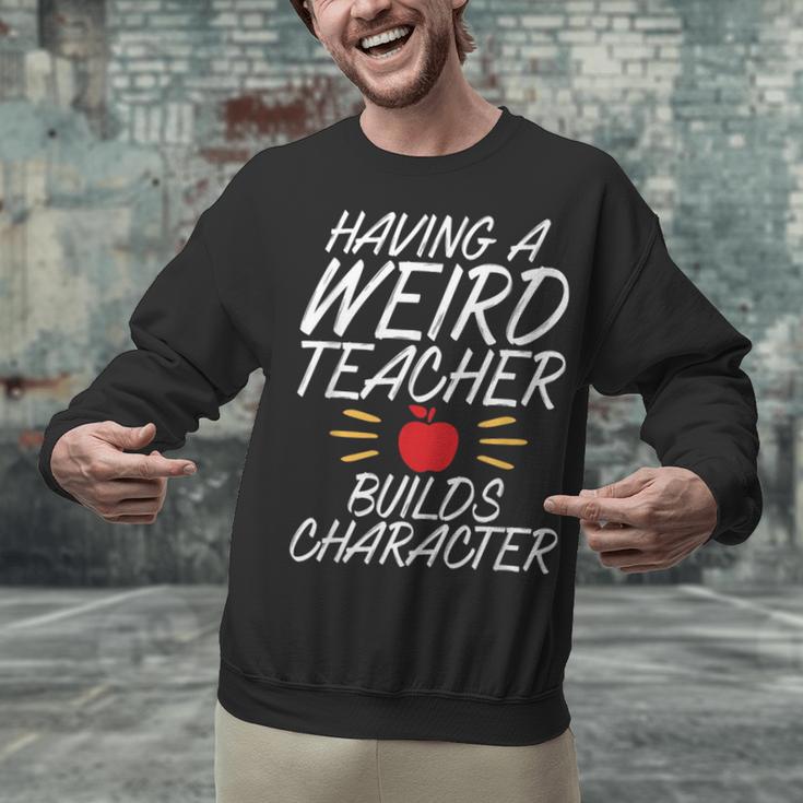 Having a Weird Teacher Builds Character School Teacher Unisex Sweatshirt, gift for family, gift for coworker Having a Weird Teacher Builds Character School Teacher Unisex Sweatshirt, gift for family, gift for coworker