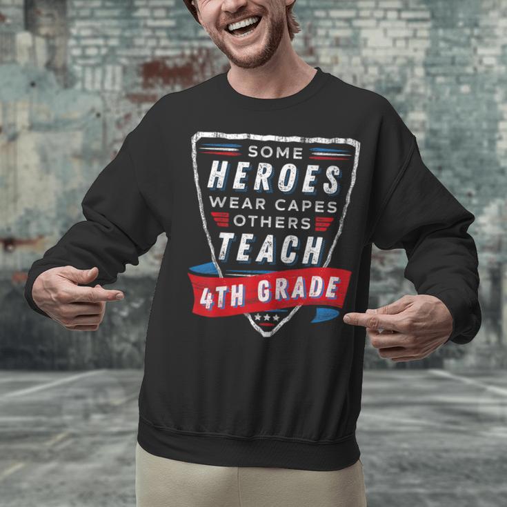 Some Heroes Wear Capes Others Teach 4th Grade Teacher Men Women Kids Unisex Sweatshirt, 4th Grade Teacher Sweatshirts, gift for family, gift for coworker Some Heroes Wear Capes Others Teach 4th Grade Teacher Men Women Kids Unisex Sweatshirt, 4th Grade Teacher Sweatshirts, gift for family, gift for coworker
