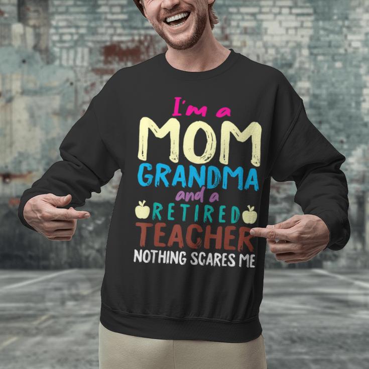 I'm Mom Grandma And A Retired Teacher Nothing Scares Me Men Women Unisex Sweatshirt, gift for family, gift for coworker I'm Mom Grandma And A Retired Teacher Nothing Scares Me Men Women Unisex Sweatshirt, gift for family, gift for coworker