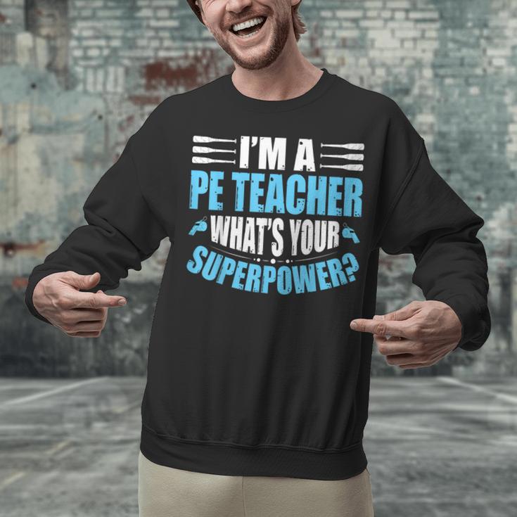 I'm A PE Teacher What's Your Superpower Physical Education Unisex Sweatshirt, Pe Teacher Sweatshirts, gift for family, gift for coworker I'm A PE Teacher What's Your Superpower Physical Education Unisex Sweatshirt, Pe Teacher Sweatshirts, gift for family, gift for coworker