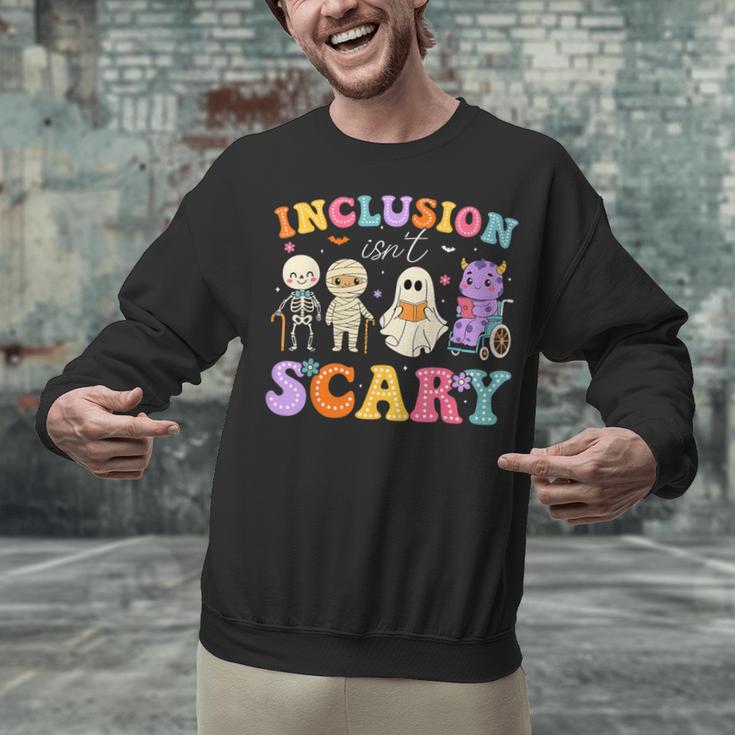 Inclusion Isn't Scary Ghost Halloween SLP Sped Teacher Unisex Sweatshirt, gift for family, gift for coworker Inclusion Isn't Scary Ghost Halloween SLP Sped Teacher Unisex Sweatshirt, gift for family, gift for coworker
