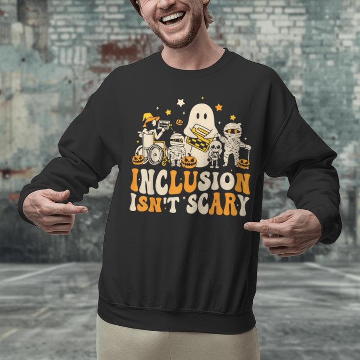 Inclusion Isn't Scary Mummy Boo Ghost Halloween SLP Teacher Unisex Sweatshirt, gift for family, gift for coworker Inclusion Isn't Scary Mummy Boo Ghost Halloween SLP Teacher Unisex Sweatshirt, gift for family, gift for coworker