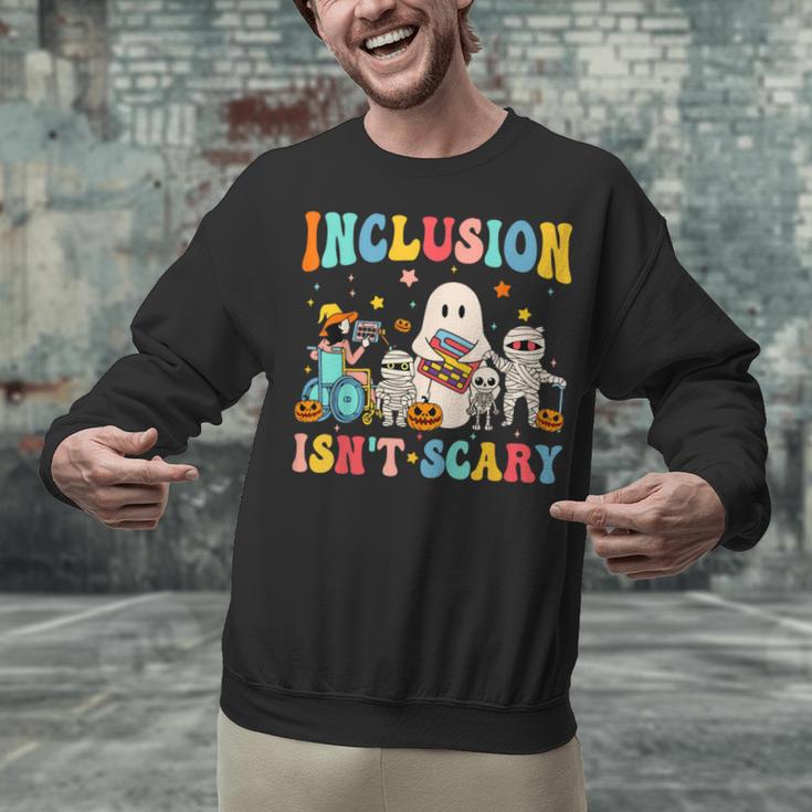 Inclusion Isn't Scary SLP Halloween Sped Teacher Therapy Unisex Sweatshirt, gift for family, gift for coworker Inclusion Isn't Scary SLP Halloween Sped Teacher Therapy Unisex Sweatshirt, gift for family, gift for coworker