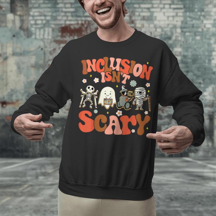 Inclusion Isn't Scary SLP Sped Teacher Halloween Unisex Sweatshirt, gift for family, gift for coworker