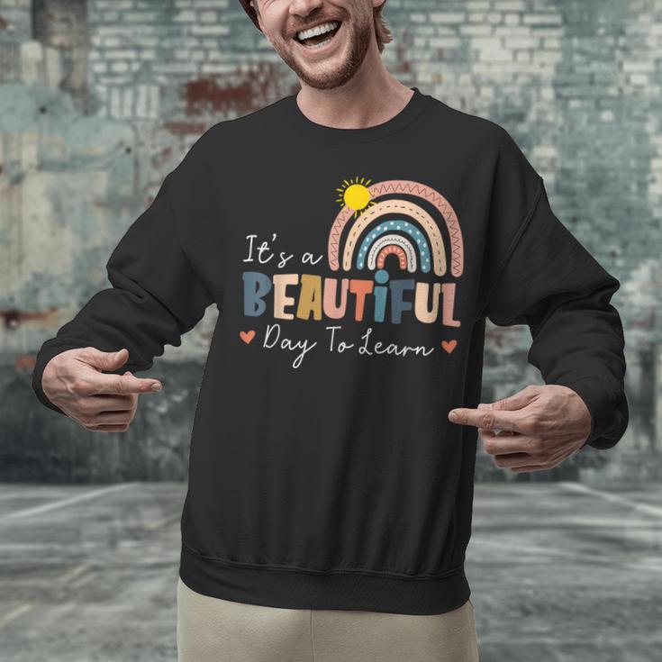 It's A Beautiful Day To Learn Cute Rainbow Boho Teacher Unisex Sweatshirt, gift for family, gift for coworker It's A Beautiful Day To Learn Cute Rainbow Boho Teacher Unisex Sweatshirt, gift for family, gift for coworker