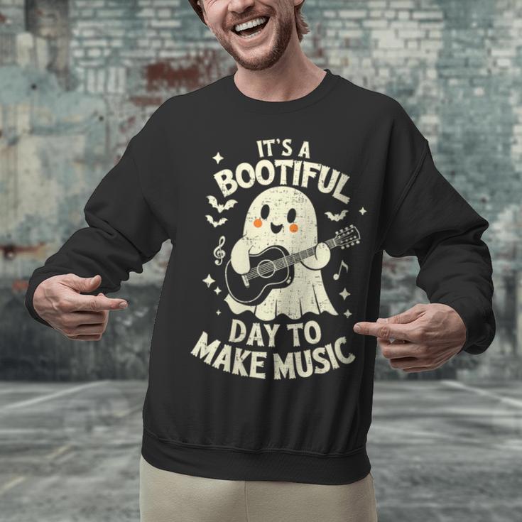 It's A Bootiful Day To Make Music Halloween Music Teacher Unisex Sweatshirt, gift for family, gift for coworker It's A Bootiful Day To Make Music Halloween Music Teacher Unisex Sweatshirt, gift for family, gift for coworker