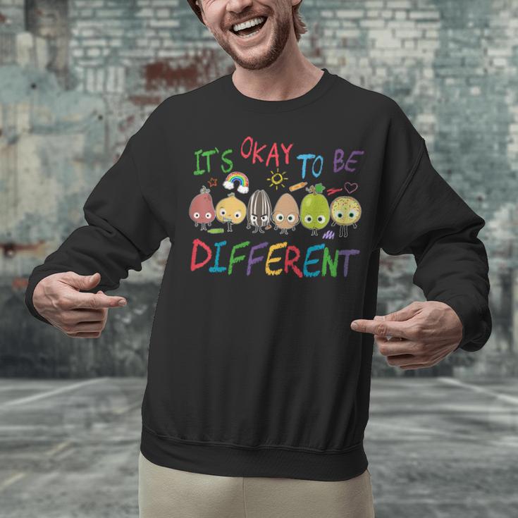 It's Ok To Be Different Apple Teacher Autism Awareness Unisex Sweatshirt, gift for family, gift for coworker