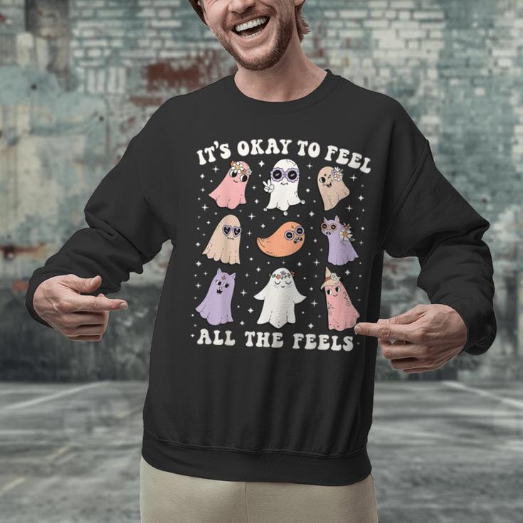 It’s Okay To Feel All The Feels Special Ed Teacher Halloween Unisex Sweatshirt, gift for family, gift for coworker