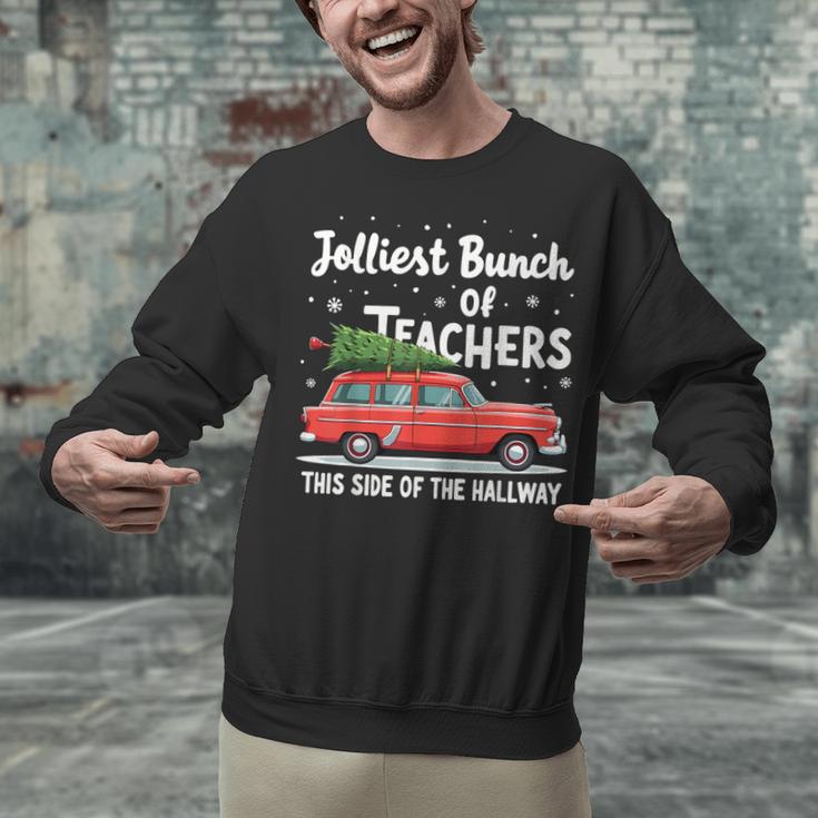 Jolliest Bunch Of Teachers This Side Of The Hallway Xmas PJ Unisex Sweatshirt, gift for family, gift for coworker Jolliest Bunch Of Teachers This Side Of The Hallway Xmas PJ Unisex Sweatshirt, gift for family, gift for coworker
