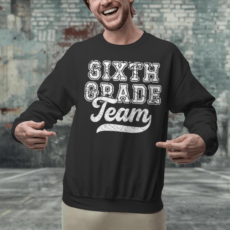 Kids Teacher Sixth Grade Retro Back To School Team 6th Grade Unisex Sweatshirt, gift for family, gift for coworker Kids Teacher Sixth Grade Retro Back To School Team 6th Grade Unisex Sweatshirt, gift for family, gift for coworker