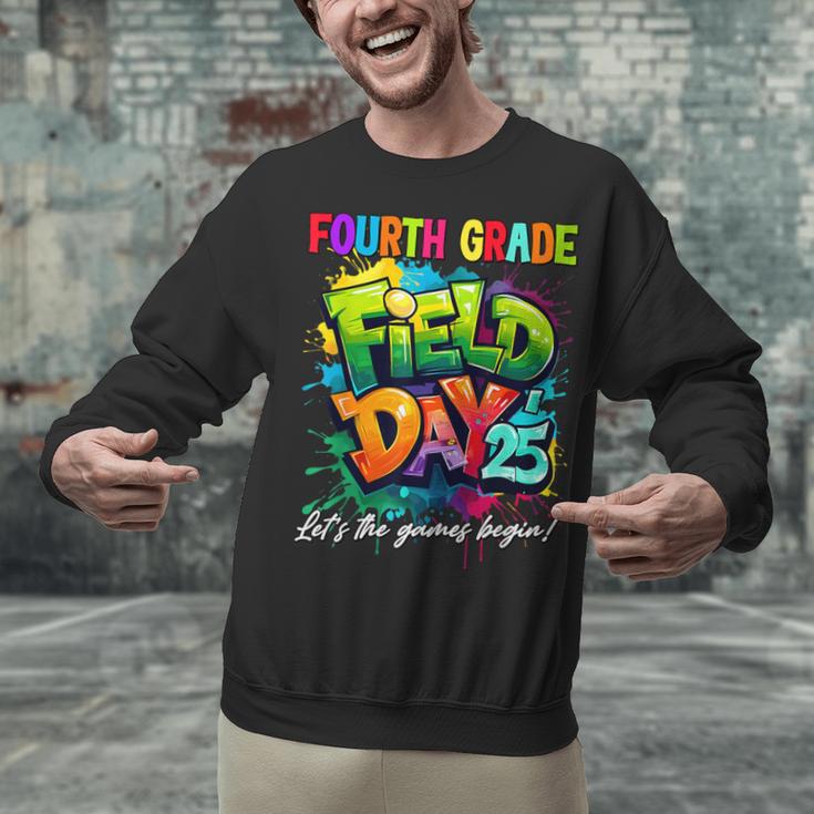 Let The Games Begin Fourth Grade Field Day 2025 Teacher Kid Unisex Sweatshirt, gift for family, gift for coworker Let The Games Begin Fourth Grade Field Day 2025 Teacher Kid Unisex Sweatshirt, gift for family, gift for coworker