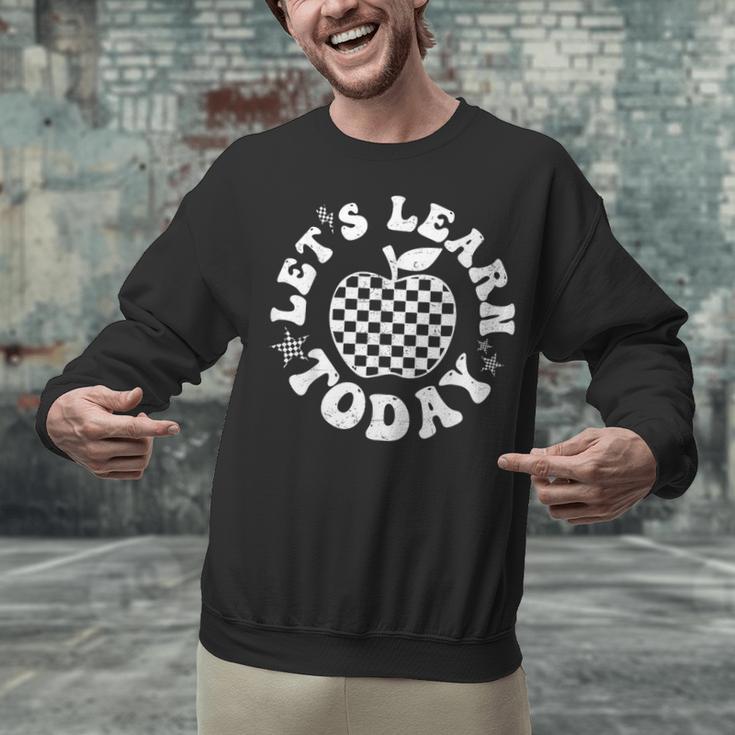 Let's Learn Today Checkered Apple Back To School Teacher Unisex Sweatshirt, gift for family, gift for coworker