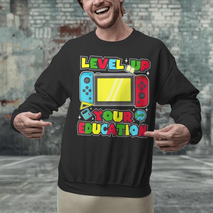 Level Up Your Education Gaming Inspired Teacher Gamers Unisex Sweatshirt, gift for family, gift for coworker Level Up Your Education Gaming Inspired Teacher Gamers Unisex Sweatshirt, gift for family, gift for coworker