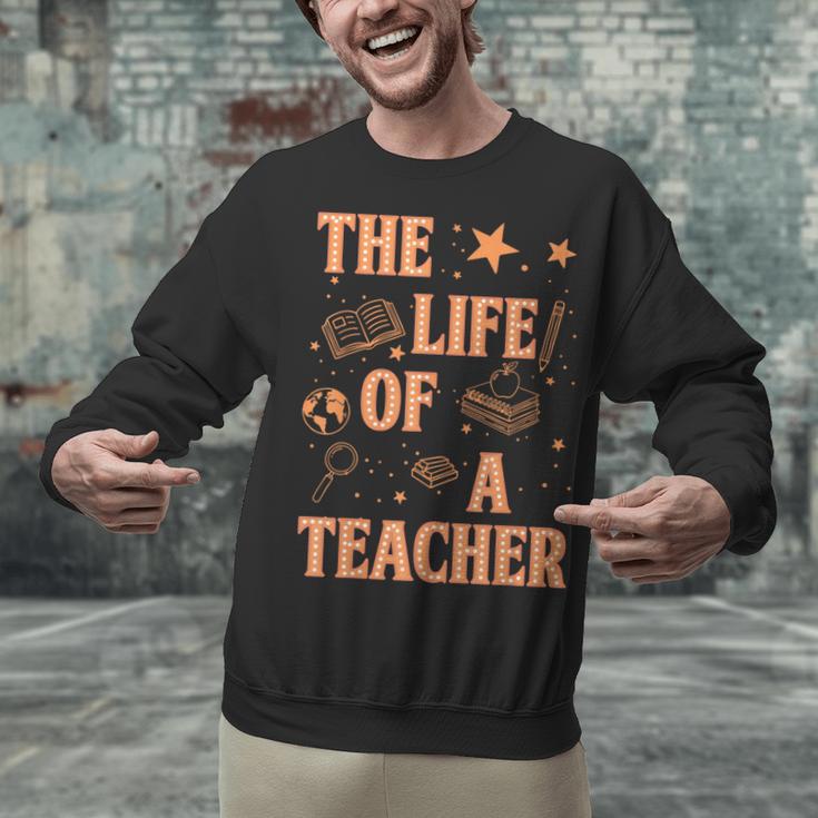 The Life Of A Teacher Back To School Women Men Unisex Sweatshirt, gift for family, gift for coworker The Life Of A Teacher Back To School Women Men Unisex Sweatshirt, gift for family, gift for coworker