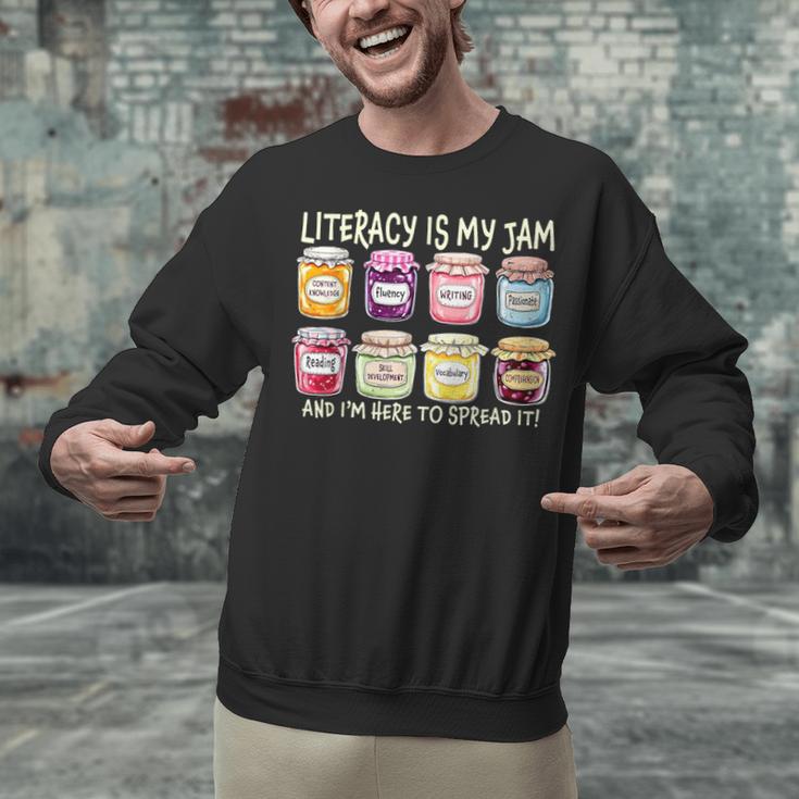 Literacy Is My Jam And I'm Here To Spread Literacy Teacher Unisex Sweatshirt, gift for family, gift for coworker Literacy Is My Jam And I'm Here To Spread Literacy Teacher Unisex Sweatshirt, gift for family, gift for coworker