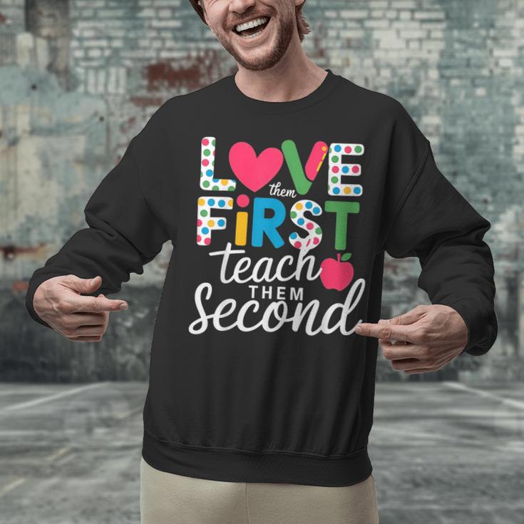 Love Them First Teach Them Second Teacher Student Love Quote Unisex Sweatshirt, gift for family, gift for coworker Love Them First Teach Them Second Teacher Student Love Quote Unisex Sweatshirt, gift for family, gift for coworker