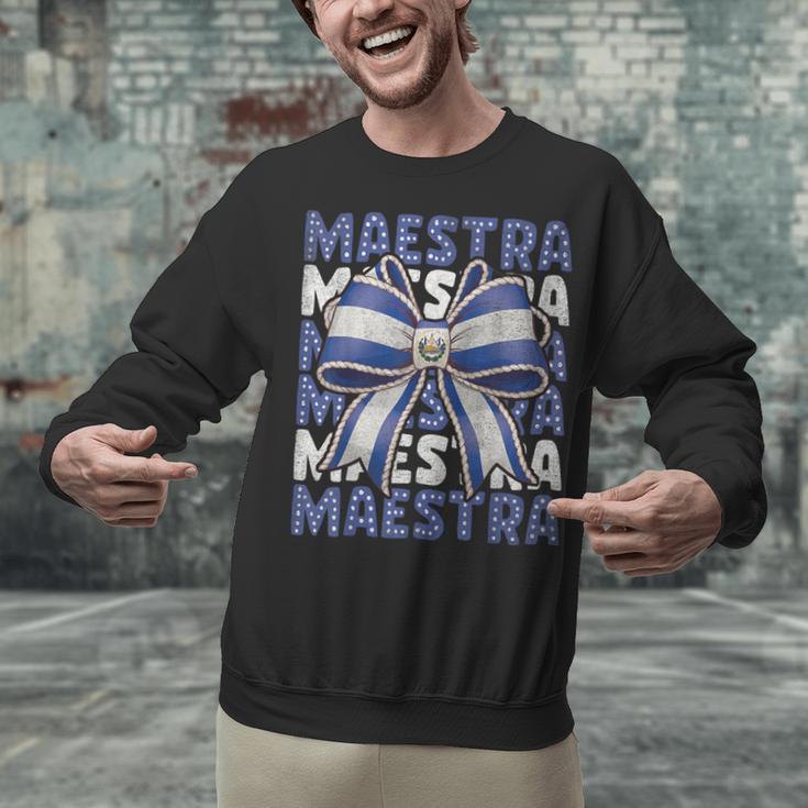 Maestra El Salvador Coquette Bow Hispanic Spanish Teacher Unisex Sweatshirt, gift for family, gift for coworker Maestra El Salvador Coquette Bow Hispanic Spanish Teacher Unisex Sweatshirt, gift for family, gift for coworker