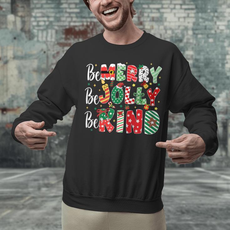Be Merry Be Jolly Be Kind Merry Christmas Teacher Xmas PJs Unisex Sweatshirt, gift for family, gift for coworker Be Merry Be Jolly Be Kind Merry Christmas Teacher Xmas PJs Unisex Sweatshirt, gift for family, gift for coworker