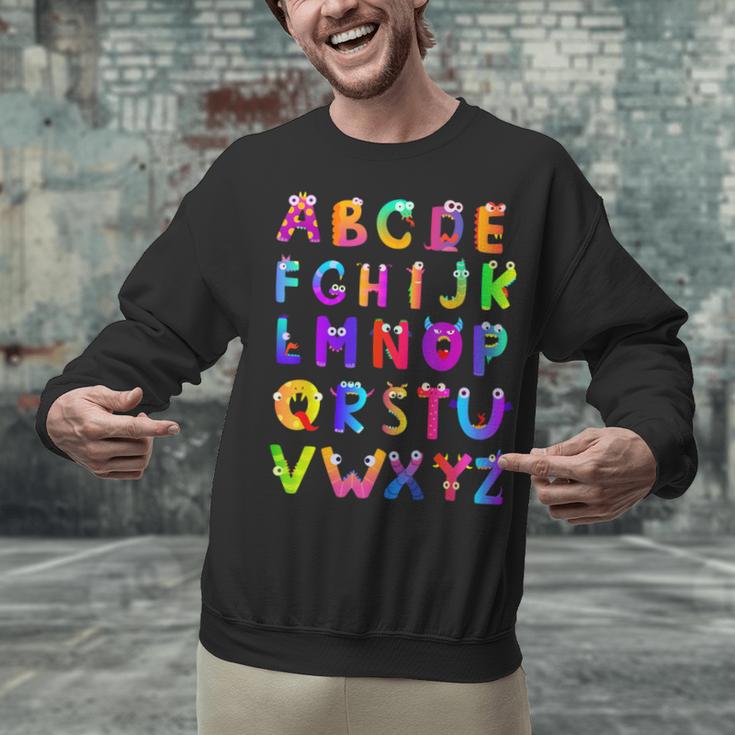 Monster ABC Cute Alphabet Halloween Teacher Costume Kids Unisex Sweatshirt, gift for family, gift for coworker Monster ABC Cute Alphabet Halloween Teacher Costume Kids Unisex Sweatshirt, gift for family, gift for coworker