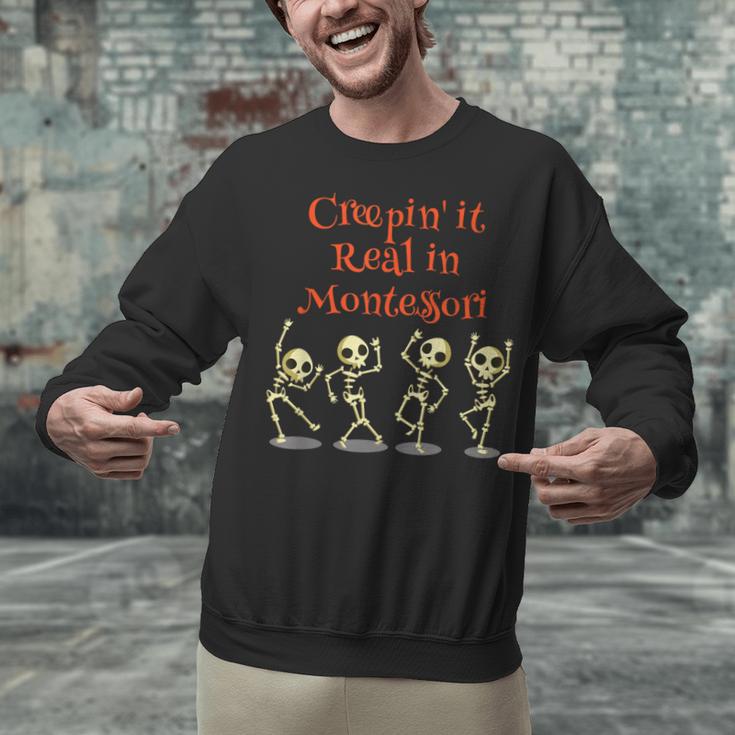 Montessori Creepin' It Real HALLOWEEN School Teacher Shirt Unisex Sweatshirt, gift for family, gift for coworker Montessori Creepin' It Real HALLOWEEN School Teacher Shirt Unisex Sweatshirt, gift for family, gift for coworker