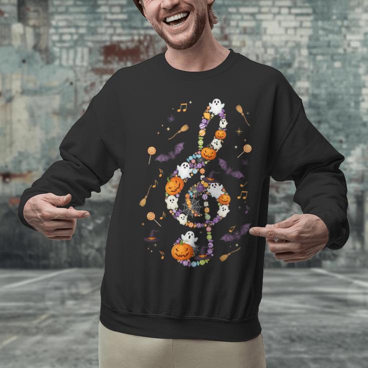 Music Note Symbol Halloween For Music Teacher Musicians Unisex Sweatshirt, gift for family, gift for coworker