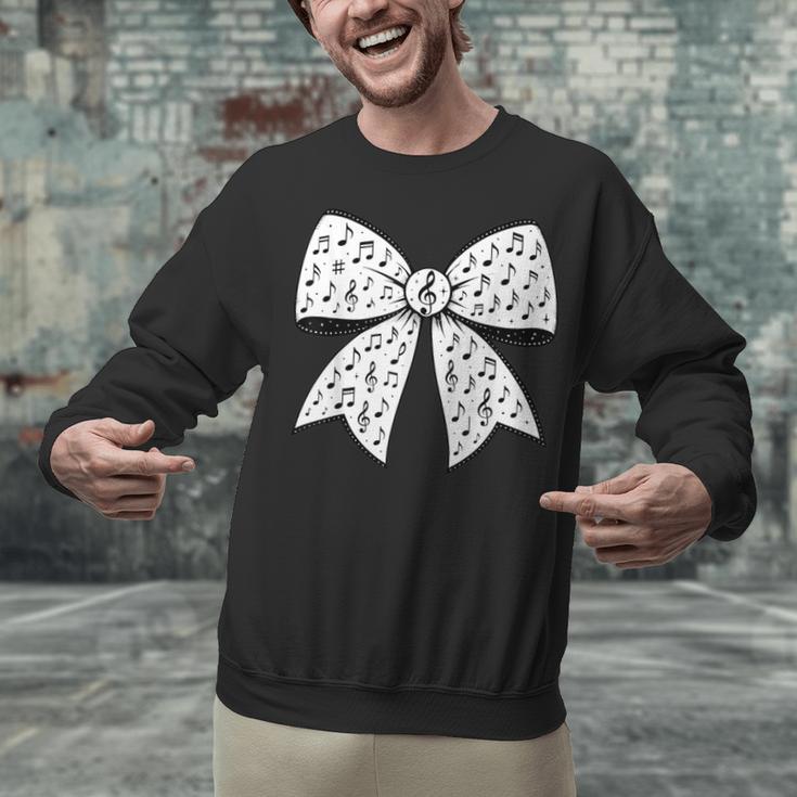 Music Notes Coquette Bow Music Teacher School Musician Band Unisex Sweatshirt, gift for family, gift for coworker Music Notes Coquette Bow Music Teacher School Musician Band Unisex Sweatshirt, gift for family, gift for coworker