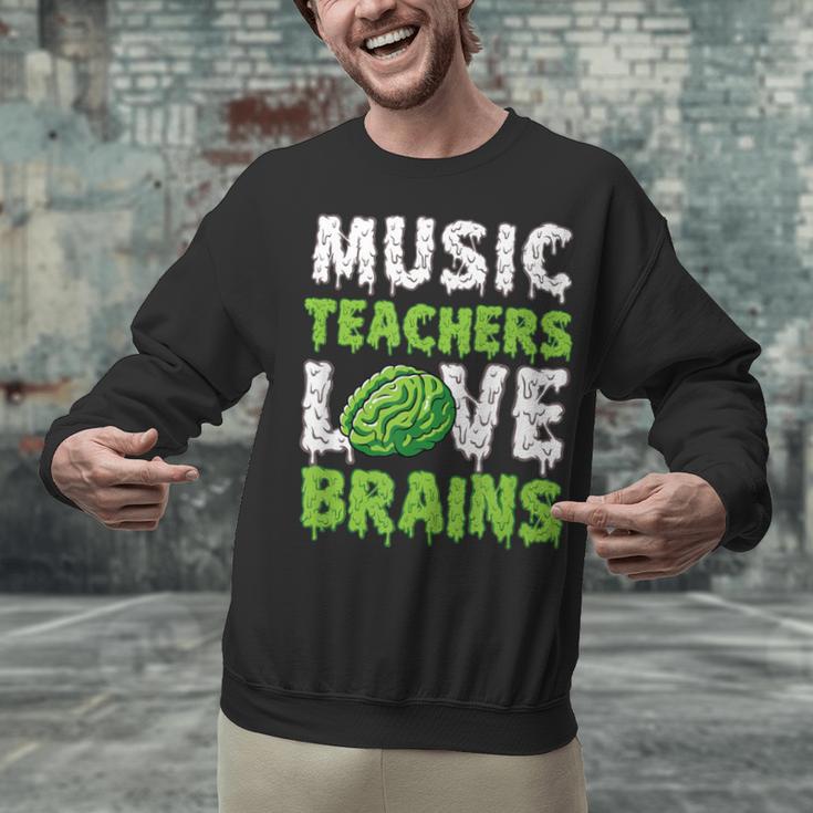 Music Teachers Love Brains Cute Teaching Halloween Unisex Sweatshirt, gift for family, gift for coworker Music Teachers Love Brains Cute Teaching Halloween Unisex Sweatshirt, gift for family, gift for coworker