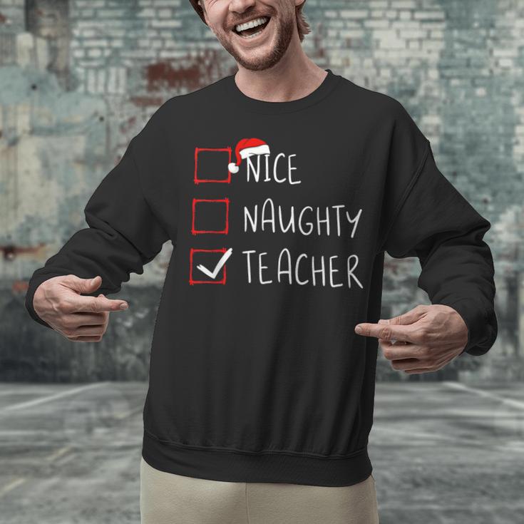 Nice Naughty Teacher Christmas List Instructor Santa Claus Men Women Unisex Sweatshirt, gift for family, gift for coworker Nice Naughty Teacher Christmas List Instructor Santa Claus Men Women Unisex Sweatshirt, gift for family, gift for coworker