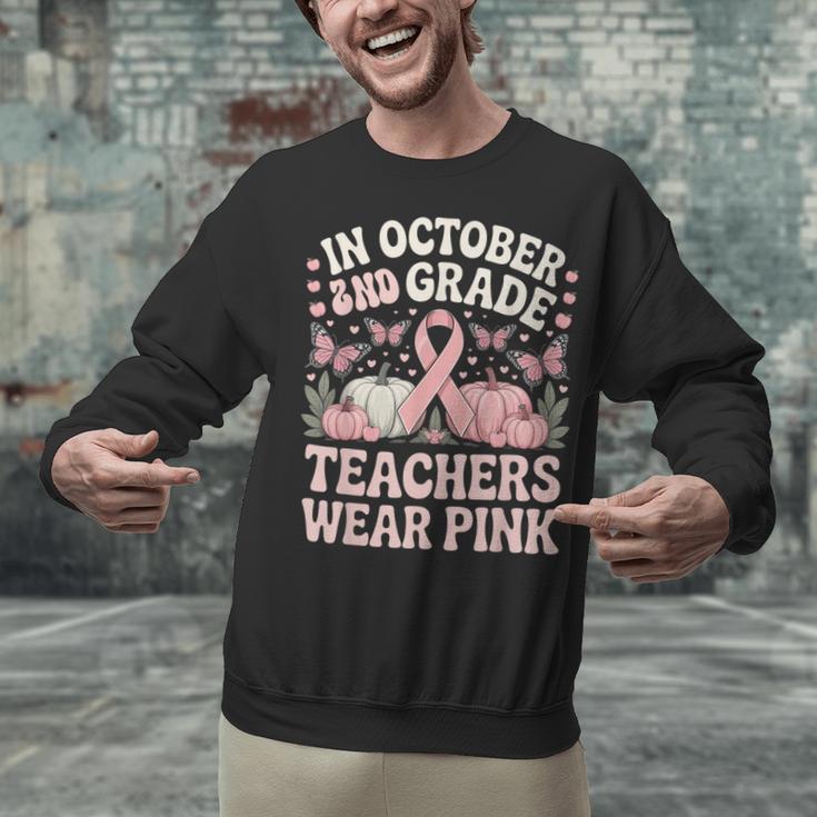 In October 2nd Grade Teachers Wear Pink Ribbon Breast Cancer Unisex Sweatshirt, gift for family, gift for coworker