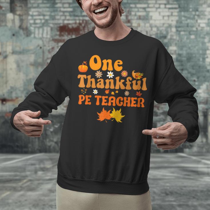 One Thankful PE Teacher Thanksgiving Fall Autumn Groovy Unisex Sweatshirt, Pe Teacher Sweatshirts, Groovy Teacher Sweatshirts, gift for family, gift for coworker