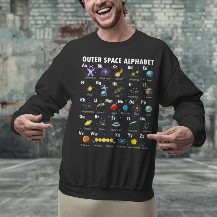 Outer Space Alphabet Kindergarten Teachers 1st Day Of School Unisex Sweatshirt, gift for family, gift for coworker Outer Space Alphabet Kindergarten Teachers 1st Day Of School Unisex Sweatshirt, gift for family, gift for coworker