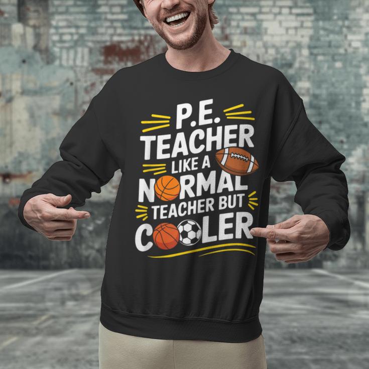 PE Coach PE Teacher Like Normal Teacher But Cooler Unisex Sweatshirt, Pe Teacher Sweatshirts, gift for family, gift for coworker PE Coach PE Teacher Like Normal Teacher But Cooler Unisex Sweatshirt, Pe Teacher Sweatshirts, gift for family, gift for coworker
