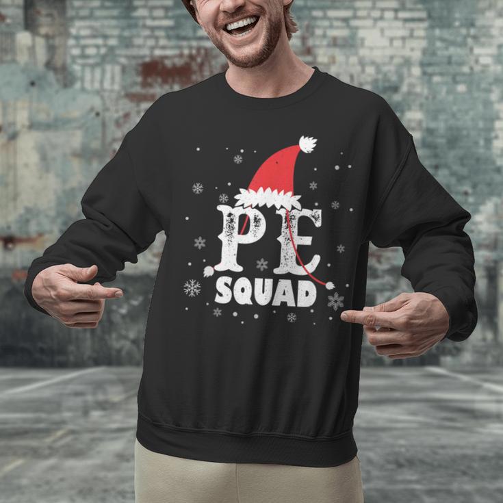 PE Squad Christmas PE Teacher Matching Xmas Unisex Sweatshirt, Pe Teacher Sweatshirts, gift for family, gift for coworker PE Squad Christmas PE Teacher Matching Xmas Unisex Sweatshirt, Pe Teacher Sweatshirts, gift for family, gift for coworker