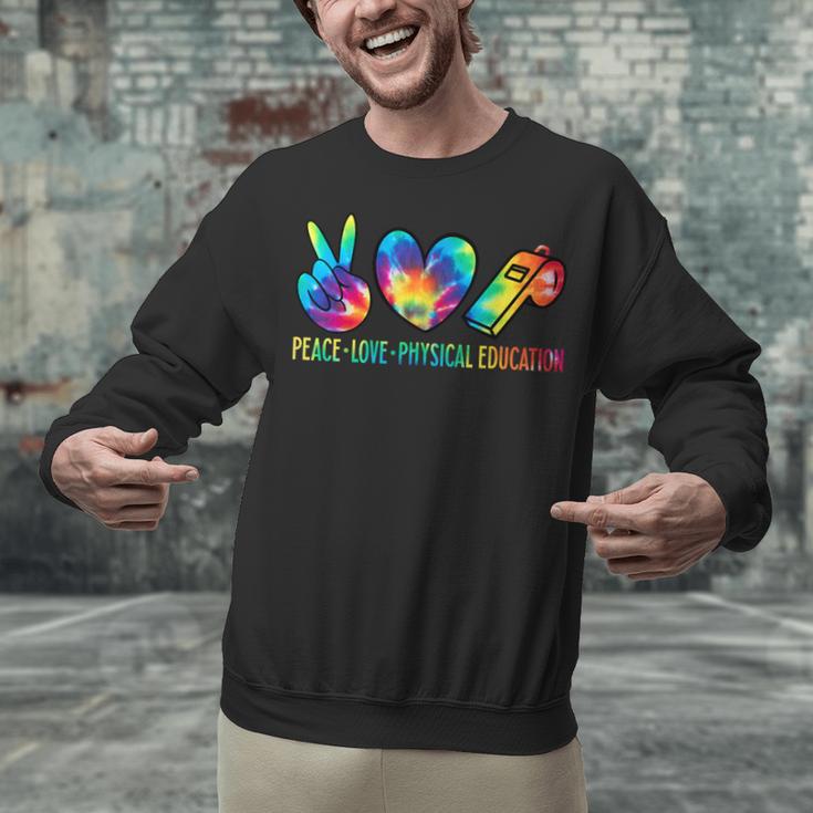 Peace Love Physical Education Tie Dye Sports PE Teacher Unisex Sweatshirt, Pe Teacher Sweatshirts, gift for family, gift for coworker Peace Love Physical Education Tie Dye Sports PE Teacher Unisex Sweatshirt, Pe Teacher Sweatshirts, gift for family, gift for coworker