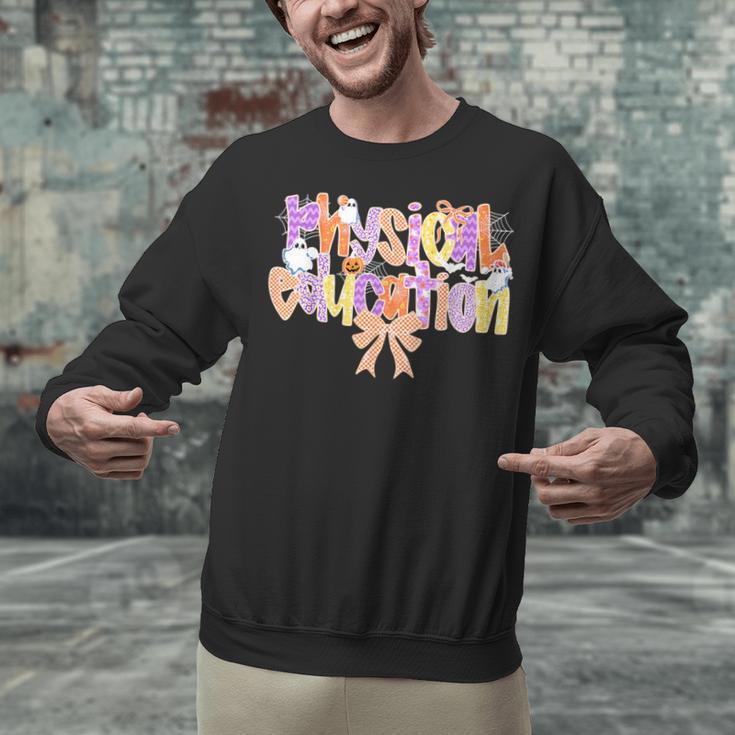 Physical Education Halloween Bow Checkered Teacher Ghost PE Unisex Sweatshirt, Pe Teacher Sweatshirts, gift for family, gift for coworker Physical Education Halloween Bow Checkered Teacher Ghost PE Unisex Sweatshirt, Pe Teacher Sweatshirts, gift for family, gift for coworker