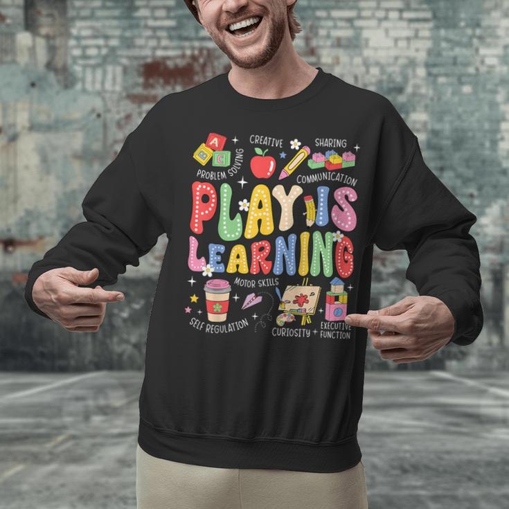 Play Is Learning Teacher First Day Of School Back To School Unisex Sweatshirt, gift for family, gift for coworker Play Is Learning Teacher First Day Of School Back To School Unisex Sweatshirt, gift for family, gift for coworker