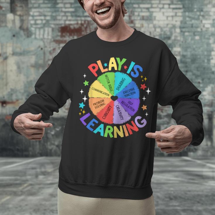 Play Is Learning Teacher Kindergarten For Men Women Kids Unisex Sweatshirt, gift for family, gift for coworker Play Is Learning Teacher Kindergarten For Men Women Kids Unisex Sweatshirt, gift for family, gift for coworker