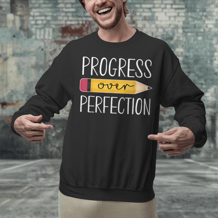 Progress Over Perfection Motivational Back To School Teacher Unisex Sweatshirt, gift for family, gift for coworker Progress Over Perfection Motivational Back To School Teacher Unisex Sweatshirt, gift for family, gift for coworker