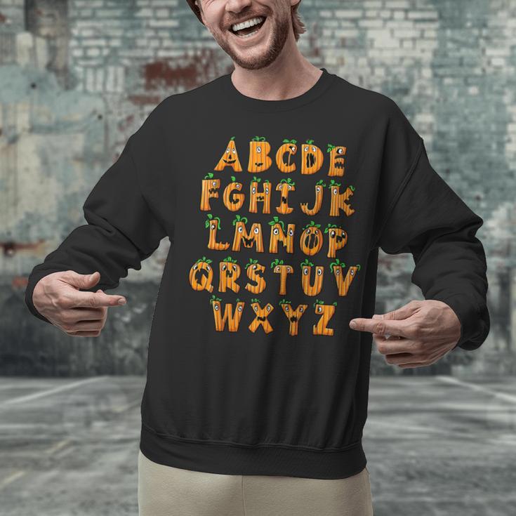 Pumpkin ABC Halloween Alphabet Costume School Teacher Kids Unisex Sweatshirt, gift for family, gift for coworker Pumpkin ABC Halloween Alphabet Costume School Teacher Kids Unisex Sweatshirt, gift for family, gift for coworker