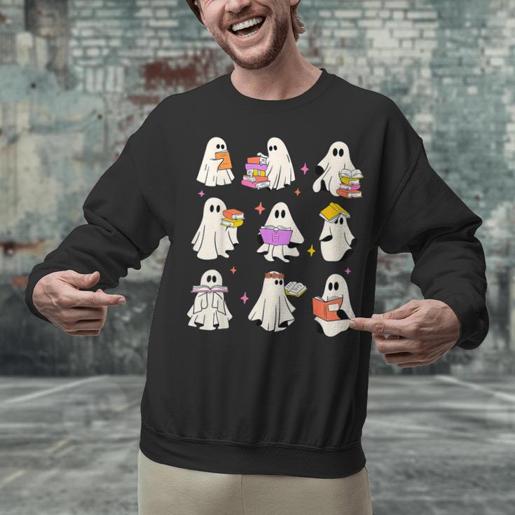 Read More Books Spooky Teacher Halloween Ghost Reading Book Unisex Sweatshirt, gift for family, gift for coworker Read More Books Spooky Teacher Halloween Ghost Reading Book Unisex Sweatshirt, gift for family, gift for coworker