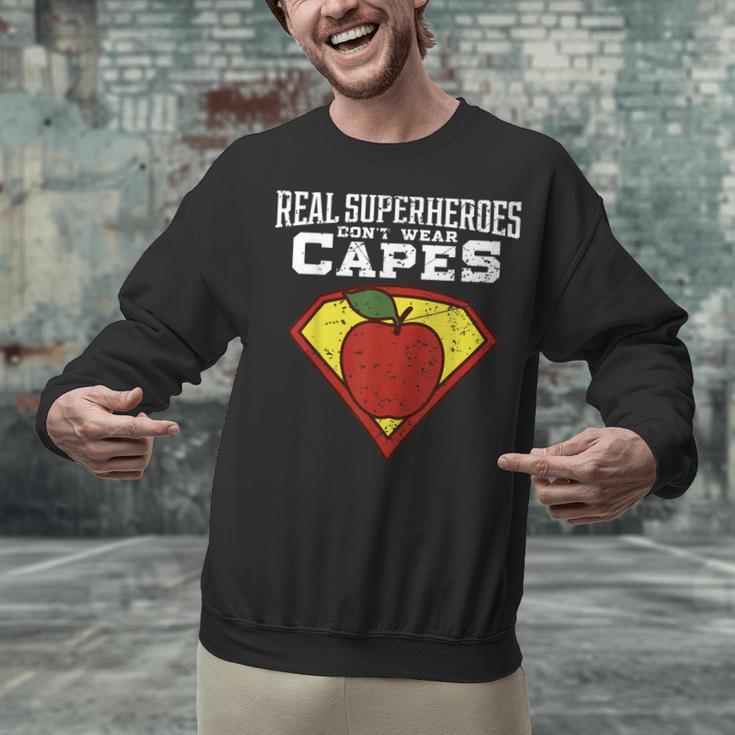 Real Superheroes Don't Wear Capes Teacher Shirt Teaching Te Unisex Sweatshirt, gift for family, gift for coworker Real Superheroes Don't Wear Capes Teacher Shirt Teaching Te Unisex Sweatshirt, gift for family, gift for coworker