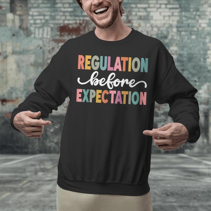 Regulation Before Expectation Cute ABA SPED Teacher Therapy Unisex Sweatshirt, gift for family, gift for coworker Regulation Before Expectation Cute ABA SPED Teacher Therapy Unisex Sweatshirt, gift for family, gift for coworker