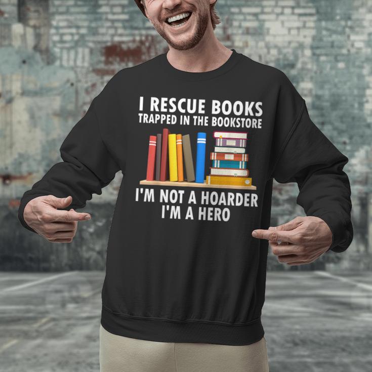 I Rescue Books Trapped In The Bookstore Book Teacher For Men Women Unisex Sweatshirt, gift for family, gift for coworker I Rescue Books Trapped In The Bookstore Book Teacher For Men Women Unisex Sweatshirt, gift for family, gift for coworker