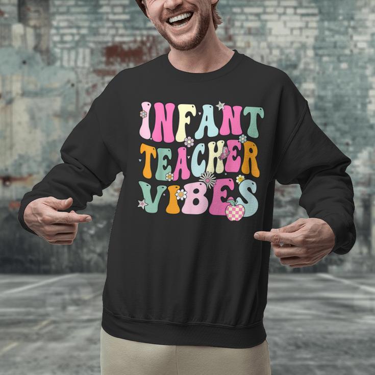 Retro Infant Teacher Vibes Women Daycare Teacher Unisex Sweatshirt, gift for family, gift for coworker Retro Infant Teacher Vibes Women Daycare Teacher Unisex Sweatshirt, gift for family, gift for coworker