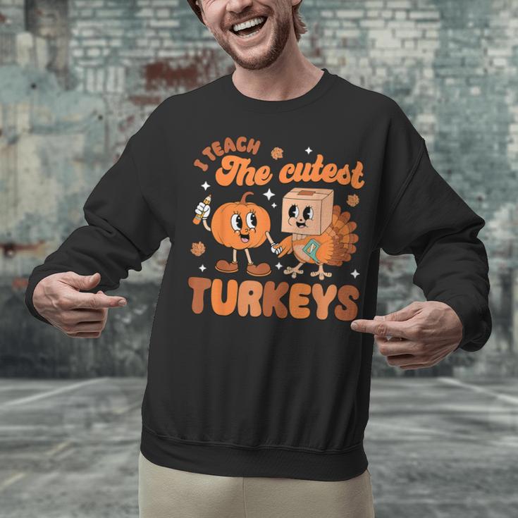 Retro I Teach The Cutest Turkey Thanksgiving Pumpkin Teacher Unisex Sweatshirt, gift for family, gift for coworker