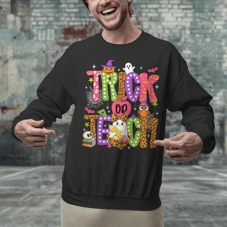 Retro Trick Or Teach Leopard Ghost Halloween Spooky Teacher Unisex Sweatshirt, gift for family, gift for coworker Retro Trick Or Teach Leopard Ghost Halloween Spooky Teacher Unisex Sweatshirt, gift for family, gift for coworker
