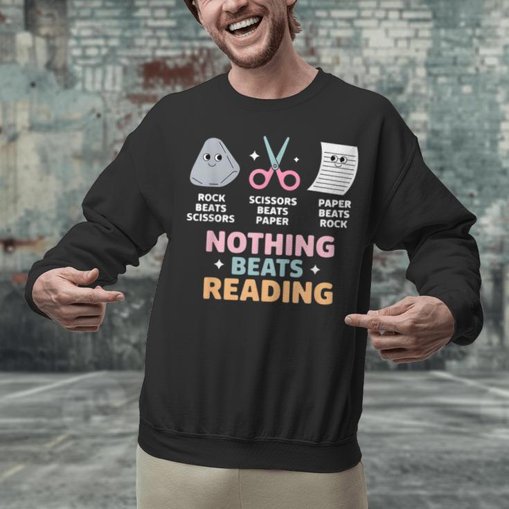 Rock Paper Scissors Teacher Librarian Nothing Beats Reading Unisex Sweatshirt, gift for family, gift for coworker Rock Paper Scissors Teacher Librarian Nothing Beats Reading Unisex Sweatshirt, gift for family, gift for coworker