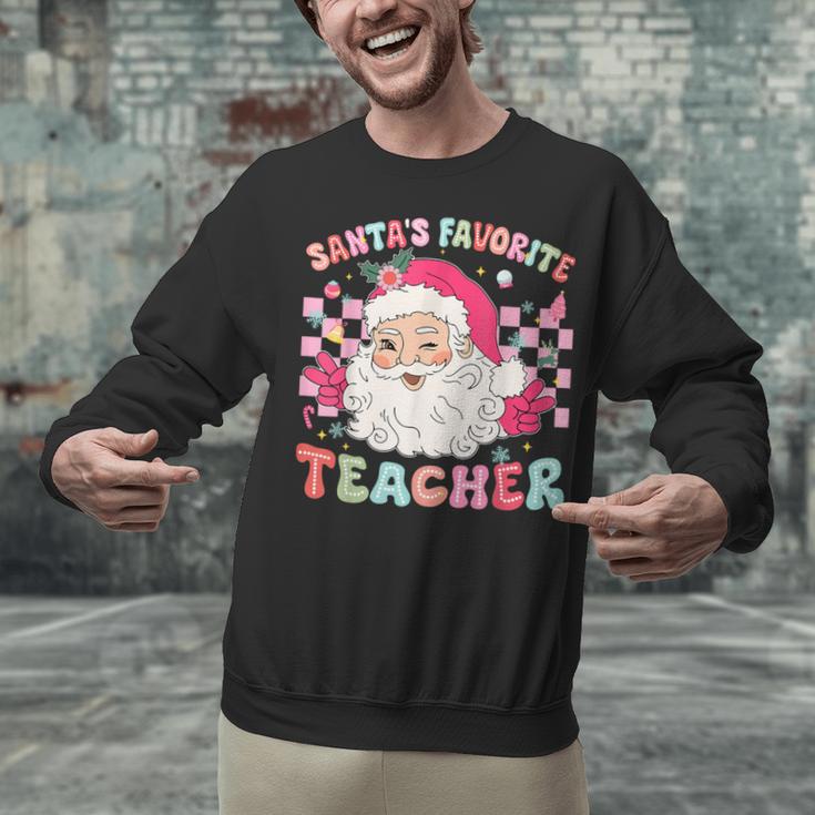 Santa Favorite Teacher Shirt Teacher Christmas Unisex Sweatshirt, gift for family, gift for coworker